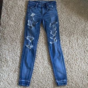 American Eagle Outfitters ripped blue skinny jeans